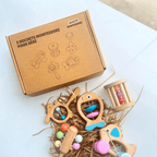 packaging coffret cinq hochets montessori pour bébé avec jouets en bois